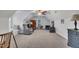 Large bonus room featuring seating area, built-in bench, ceiling fan, and furniture at 212 Hein Dr, Clayton, NC 27527