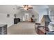 Spacious bonus room with seating, desk and furniture at 212 Hein Dr, Clayton, NC 27527