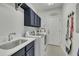 Convenient laundry room with sink, washer and dryer at 212 Hein Dr, Clayton, NC 27527