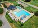 Beautiful aerial view of community pool with plenty of seating at 212 Hein Dr, Clayton, NC 27527