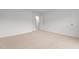Bedroom featuring neutral carpet, white walls, and a white door at 2214 Bayswater Dr, Creedmoor, NC 27522