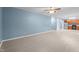 Large living room featuring tile floors, neutral paint, and an open floor plan with kitchen access at 2214 Bayswater Dr, Creedmoor, NC 27522