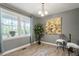Dining room with natural light, neutral color palette, and laminate floors at 2314 Clements Dr, Durham, NC 27704