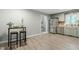 Dining area with table, stools, view of kitchen with stainless steel appliances at 2314 Clements Dr, Durham, NC 27704