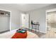 Bright main bedroom showcasing a walk-in closet and en-suite bathroom at 2314 Clements Dr, Durham, NC 27704