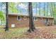 Brick home with a rear entrance and well-maintained yard at 2314 Clements Dr, Durham, NC 27704
