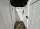 Private outdoor shower featuring white fencing and pebble flooring at 2385 Olde Spring Ct, Graham, NC 27253