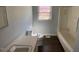 Bathroom with a standard tub, toilet and sink at 24 Pine St, Franklinton, NC 27525