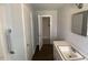Bathroom with updated plumbing and flooring at 24 Pine St, Franklinton, NC 27525