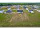 Aerial view showcasing the property's location within a spacious neighborhood at 241 Indigo St, Lillington, NC 27546