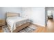 Bedroom with neutral decor, area rug, and a view to an office space at 241 Indigo St, Lillington, NC 27546