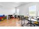 Spacious bonus room features hardwood floors, natural lighting, and ample room for multiple activities at 241 Indigo St, Lillington, NC 27546