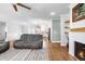 Open-concept living room connected to a modern kitchen and dining area, ideal for entertaining at 241 Indigo St, Lillington, NC 27546