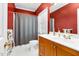 Bathroom featuring a shower-tub combo and wood vanity cabinet at 3001 Greystone Dr, Rocky Mount, NC 27804