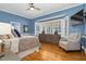 Cozy bedroom with hardwood floors, a bay window, and stylish decor at 3001 Greystone Dr, Rocky Mount, NC 27804