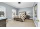 Serene bedroom featuring a ceiling fan, plush carpet and soothing color palette at 3001 Greystone Dr, Rocky Mount, NC 27804