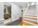 Inviting hallway showcasing wood flooring and staircase, leading to other areas of the home at 3001 Greystone Dr, Rocky Mount, NC 27804