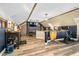 Open Living Area featuring a bar, dining area, exercise equipment, and tv at 3001 Greystone Dr, Rocky Mount, NC 27804