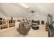 Bright living area features vaulted ceilings, recessed lighting, and cozy furniture at 3001 Greystone Dr, Rocky Mount, NC 27804
