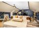 Spacious living room with a large tv, comfortable seating, and stylish decor at 3001 Greystone Dr, Rocky Mount, NC 27804