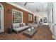 Spacious brick patio with comfortable seating and white columns at 3001 Greystone Dr, Rocky Mount, NC 27804