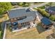 Expansive backyard features a screened porch, patio, and detached garage, perfect for outdoor entertaining at 3001 Greystone Dr, Rocky Mount, NC 27804