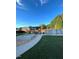 Spacious backyard highlighting an above-ground pool, outdoor seating beneath a pergola, and landscaped area at 3098 Creek Point Rd, Graham, NC 27253