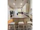 Island kitchen features granite countertops, a mosaic backsplash, and decorative lighting at 3098 Creek Point Rd, Graham, NC 27253