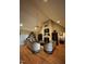 Large living room featuring a fireplace and abundant seating at 3098 Creek Point Rd, Graham, NC 27253