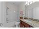 This full bathroom features a tub/shower combination and a granite vanity at 312 Alliance Cir, Cary, NC 27519
