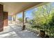 Charming front porch with white railing, providing an inviting outdoor space and a view of the neighborhood at 312 Alliance Cir, Cary, NC 27519