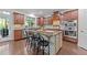 A kitchen featuring granite countertops, stainless steel appliances and a center island with seating at 312 Alliance Cir, Cary, NC 27519