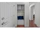 Convenient mud room with storage and bench seating near hardwood floors at 312 Alliance Cir, Cary, NC 27519