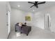 Home office space with natural light featuring a ceiling fan and comfortable seating at 312 Alliance Cir, Cary, NC 27519