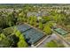 Aerial view of community tennis courts surrounded by lush greenery and convenient pedestrian crosswalks at 320 Easton Grey Loop, Cary, NC 27519