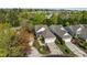 Aerial view of a property with lush landscaping, showcasing its charming curb appeal and serene surroundings at 320 Easton Grey Loop, Cary, NC 27519