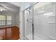 Bathroom with modern walk-in shower, showing connection to the main bedroom at 320 Easton Grey Loop, Cary, NC 27519