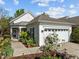 Charming home with a manicured front yard and inviting entrance, showcasing its curb appeal at 320 Easton Grey Loop, Cary, NC 27519