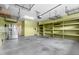 Spacious garage featuring high ceilings, ample storage, and room for multiple vehicles at 320 Easton Grey Loop, Cary, NC 27519