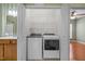 Conveniently located laundry area with modern appliances and direct access to closet at 320 Easton Grey Loop, Cary, NC 27519
