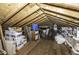 Attic space with wooden beams and flooring, and plenty of storage options and natural light at 3609 Hawthorne Rd, Rocky Mount, NC 27804