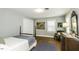 Bedroom featuring hardwood floors, a small bed, and plenty of natural light at 3609 Hawthorne Rd, Rocky Mount, NC 27804