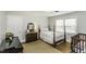 Bright bedroom with hardwood floors, natural light, and a bed at 3609 Hawthorne Rd, Rocky Mount, NC 27804
