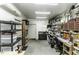 Well-organized garage with shelving, work benches and fluorescent lighting at 3609 Hawthorne Rd, Rocky Mount, NC 27804