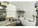 Functional utility sink area with shelving, lighting and plenty of work space at 3609 Hawthorne Rd, Rocky Mount, NC 27804