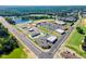 Aerial view of shopping center, businesses, lake and the surrounding neighborhood at 39 Drayton St, Clayton, NC 27527