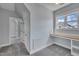 Carpeted bedroom featuring a built in desk with storage, and lots of natural light at 39 Drayton St, Clayton, NC 27527