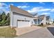 Lovely home featuring an attached garage, a welcoming porch, and professionally landscaped grounds at 39 Drayton St, Clayton, NC 27527