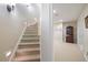 Basement with carpeted stairs leading to more living space at 3928 White Chapel Way, Raleigh, NC 27615