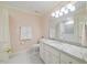 Elegant bathroom featuring a spacious vanity, granite countertops, and a well-lit mirror for a luxurious feel at 3928 White Chapel Way, Raleigh, NC 27615